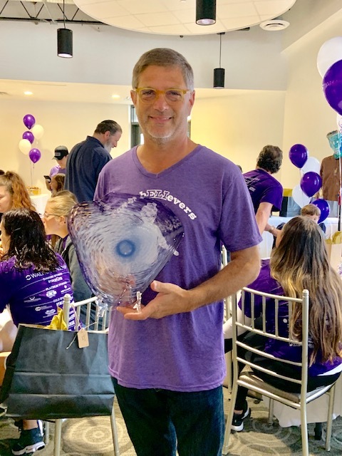 Eli_s Dad and trophy.jpg